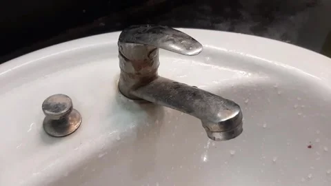 Sink faucet that keeps dripping, broken faucet leaking Stock Footage 284442900