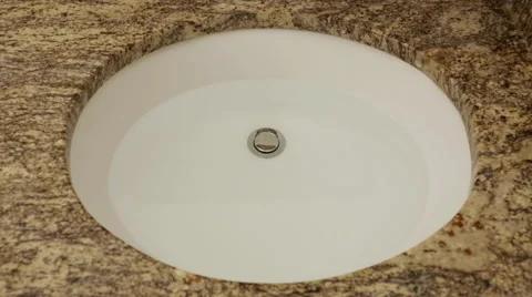 Sink full of water draining Stock Footage 67274594