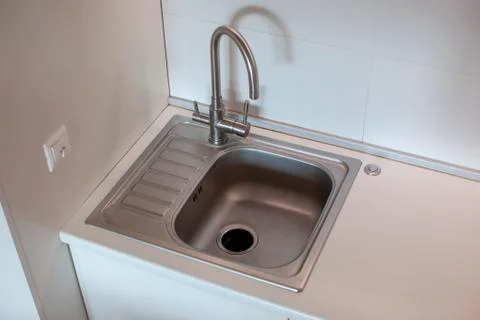 Sink on the kitchen. Close-up. Modern interior. Stock Photos