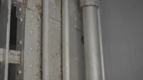 Sink in old prison panning bars Stock Footage 345762466