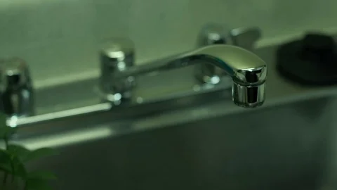 Sink with slow motion water drip Stock Footage 79611311