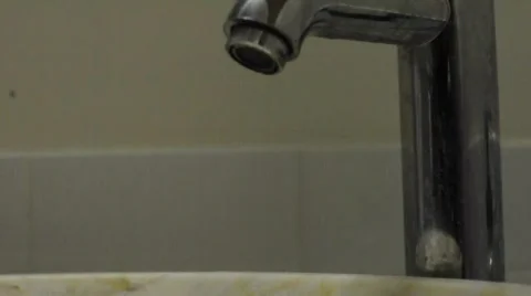 Sink turns on and off Stock Footage 548159