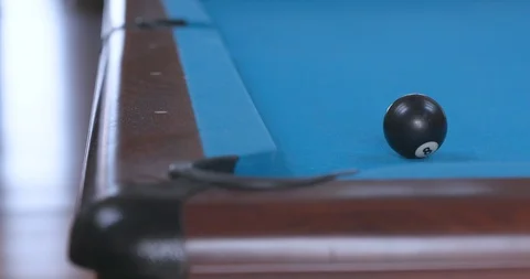 Sinking 8 Ball in Corner Pocket on Blue Billiards Table Stock-Footage 88227037