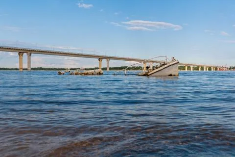 Sinking boat in a river Stock Photos
