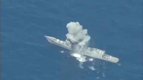 Sinking Exercise during RIMPAC. Hits by Missiles and Torpedoes 016 Video stock 166441784