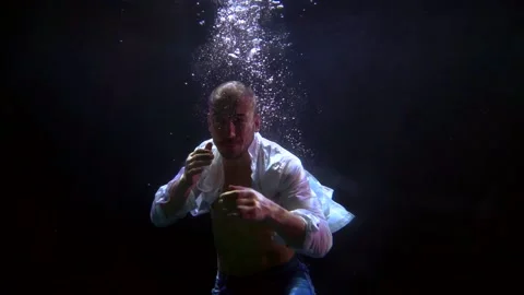 sinking man is fighting inside water, un... | Stock Video | Pond5