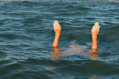 The sinking person, the concept of help Stock-Fotos