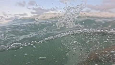 Sinking perspective in sea with hand extending above water and motion of ai.. Stock Footage 315694401