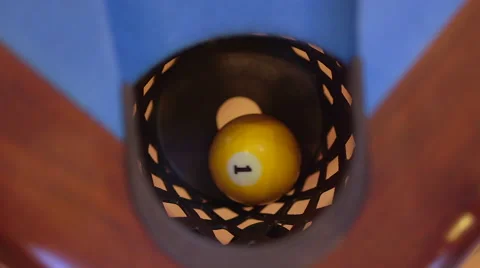 Sinking Pool Ball in Corner Pocket on Blue Billiards Table Stock Footage 65974788