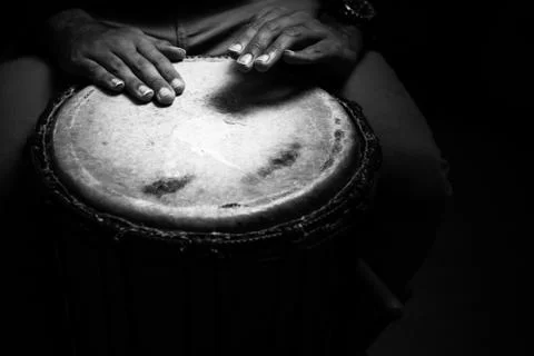 Sinlge West African Drum in Dramatic Single Light Black and White Stock Photos