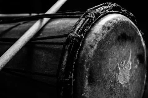 Sinlge West African Drum in Dramatic Single Light Black and White Stock Photos