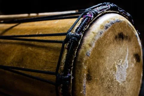 Sinlge West African Drum in Dramatic Single Light. Stock Photos