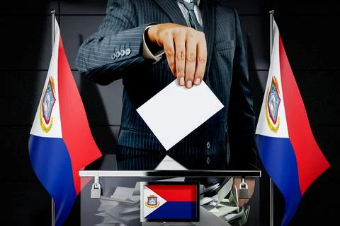 Sint Maarten flags, hand dropping voting card - election concept Ilustración de archivo