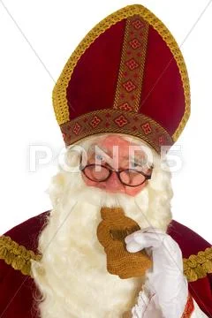 Sinterklaas is eating speculaas Stock Photos