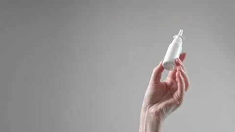 Sinusitis medication for treating sinus inflammation, woman using nasal drops, n Stock Footage 285624760
