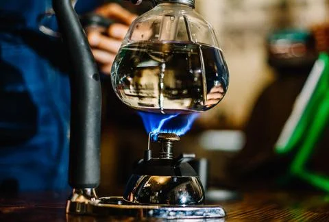 Siphon vacuum coffee maker on cafe bar Stock Photos