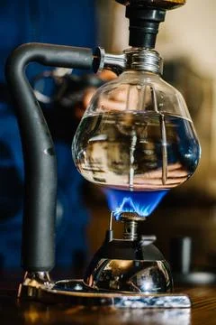 Siphon vacuum coffee maker on cafe bar Stock Photos