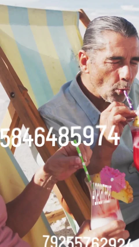 Sipping tropical drinks on beach, couple relaxing with numbers animation over Stock Footage 343159200