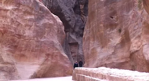 Siq gorge. Jordan. Sandstone cliffs along road leading to ancient city of Petra Stock Footage 149301286