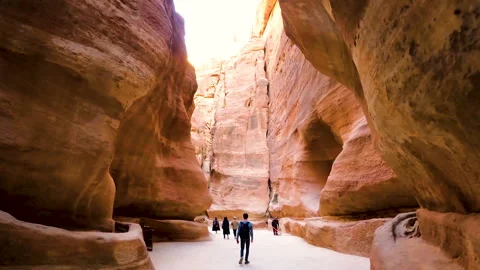 The Siq, a passageway between cliffs in the city of Petra. Stock Footage 144056519