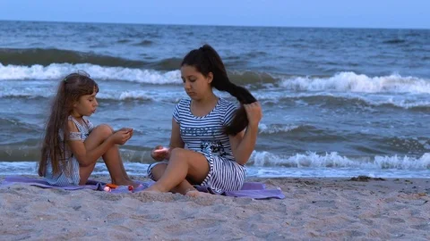 Sisters on the beach mold from plasticine Stock Footage 112434304