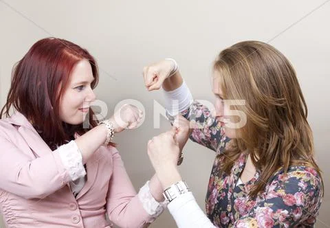 Sisters fighting Stock Photos