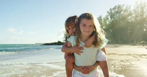 Sisters Having Fun at the Beach Stock Footage 69274382
