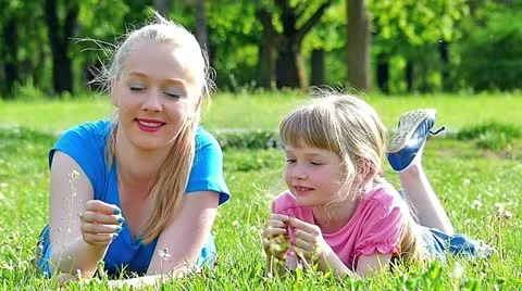 Sisters having fun in the park slow motion Stock Footage 24673478