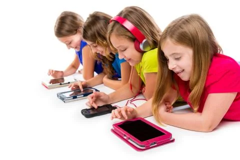 Sisters kid girls tech tablets and smatphones Stock Photos