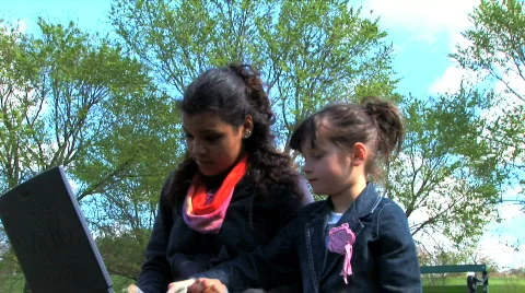 Sisters on a laptop Stock Footage 361743