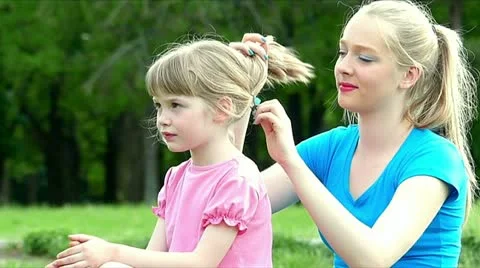 Sisters in the park Stock Footage 24673507