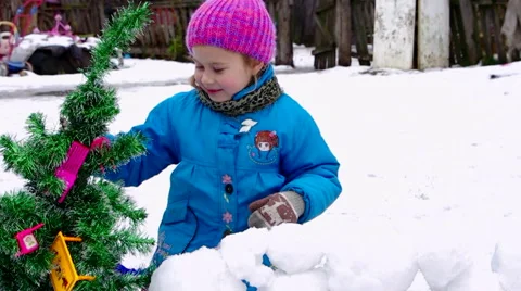 Sisters playing with Christmas tree Stock Footage 57905306