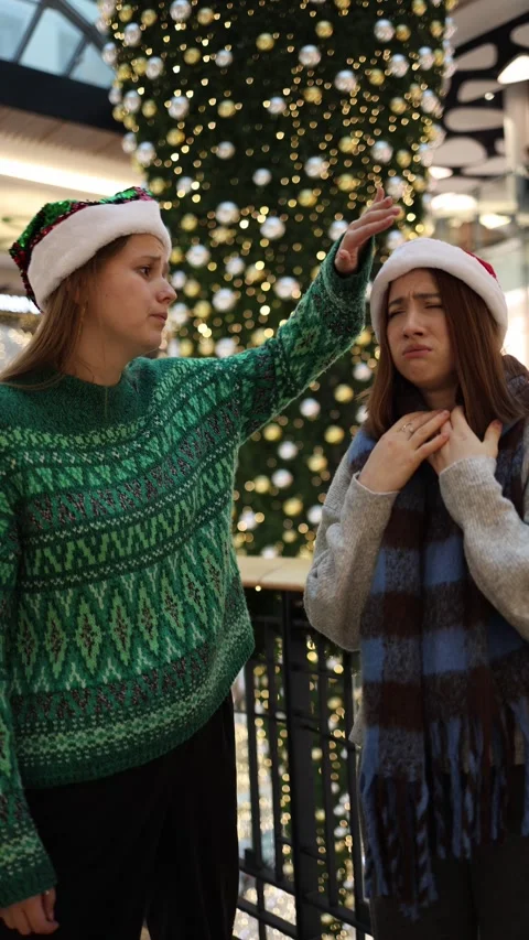 Sisters preparing for new year as one feels sick in festive holiday mood Stock Footage 324814921