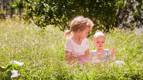 Sisters rest in the park Stock Footage 30363337