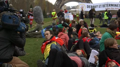 Sit-in climate protester TVinterview by media, UN COP21 Paris France Stock Footage 59219246