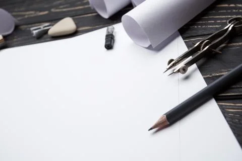 Sit at the table and create your drawing Stock Photos