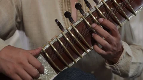 Sitar Hand Play, Focused Sitar Player Demonstrating Raga Techniques In Cozy Stock Footage 323776480