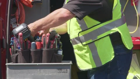 On site Construction contractor Worker Retrieve Tools on Cart to work at jobsite Video stock 161801071