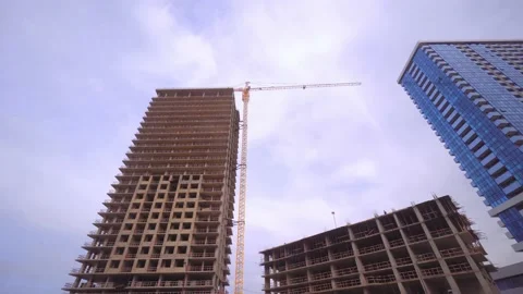 Site with high-rise cranes. Construction of modern apartment buildings Vídeos de archivo 182991405