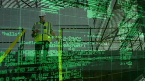Site inspector consulting plans and descending stairs while green code overlay Stock Footage 331045912