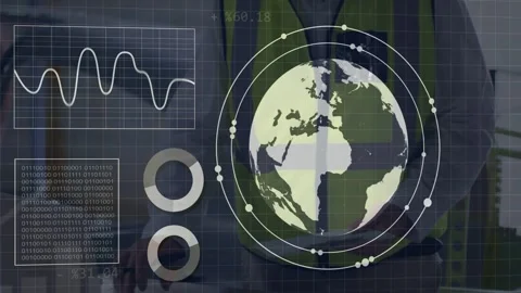 Site manager at table starting globe overlay, viewing HUD charts animating for Stock Footage 332625515