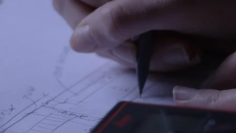 Site measuring, drawing, writing Stock Footage 100407837