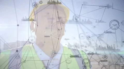 Site worker turning head upward as animated network nodes sweeping across vest, Stock Footage 334182832