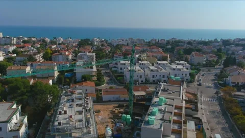 Sitges' Urban Evolution: Aerial View of Construction and Coastal Splendor Stock Footage 263360505
