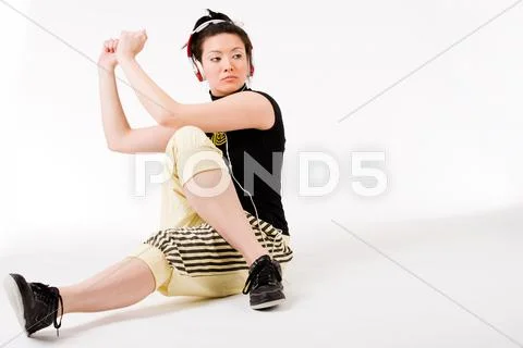 Sitting and dancing on my favourite music Stock Photos