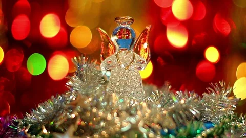 Sitting angel on the christmas background Stock Footage 97649487