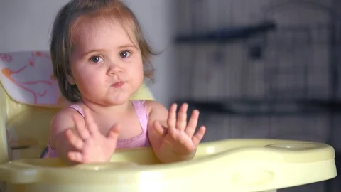 Sitting baby eats Stock Footage 98699898