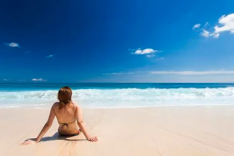 Sitting on the beach Stock Photos