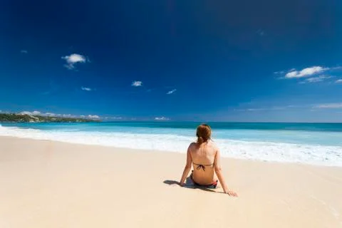 Sitting on the beach Stock Photos