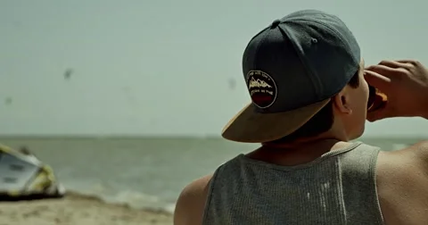 Sitting On The Beach Shallow Depth 4k Stock Footage 51095420